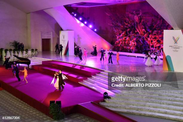 Athletes and dancers perform before the arrival of Pope Francis during the opening ceremony of a Vatican seminar on sport and society in the Paul VI...