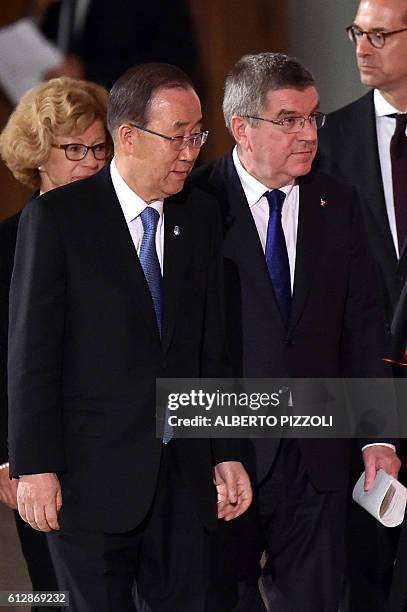 United Nations Secretary General Ban Ki-moon and International Olympic Committee President Thomas Bach arrive for the opening ceremony of a Vatican...