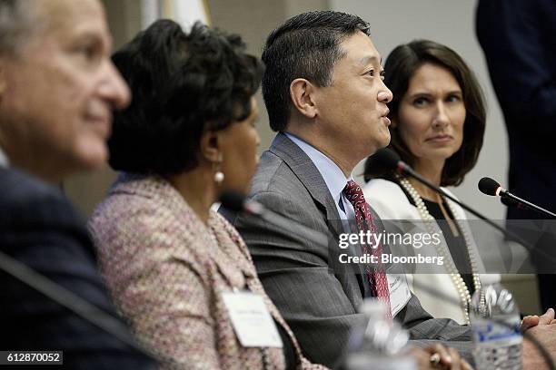 David Kim, deputy administrator of the Federal Highway Administration, second right, speaks during a panel discussion with Mark Rosekind,...
