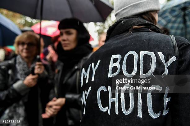 Wwoman with an inscription on her jacket "My body, my choice" participates in the Black Monday, a nationwide women's pro-abortion protest on October...