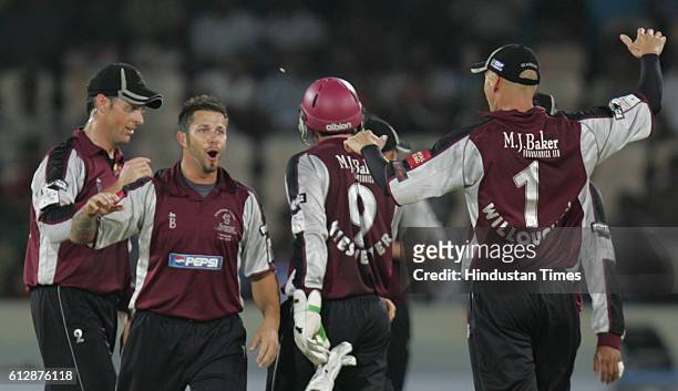 Peter Trego of Somerset celebrates bowling VVS Laxman of the Deccan Chargers during the Airtel Champions League Twenty20 Group A match between the...
