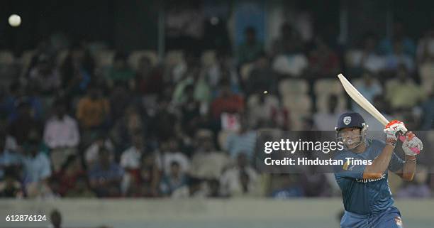 Andrew Symonds of the Deccan Chargers hits the ball towards the boundary during the Airtel Champions League Twenty20 Group A match between the Deccan...