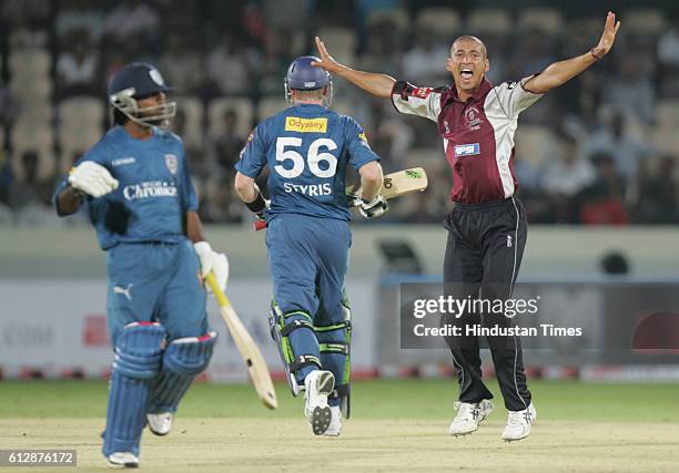 Alfonso Thomas of Somerset celebrates bowling Scott Styris of the Deccan Chargers for LBW during the Airtel Champions League Twenty20 Group A match...