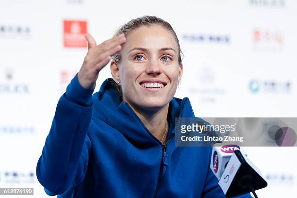 Angelique Kerber of Germany speaks during a press conference on day five of the 2016 China Open at the China National Tennis Centre on October 5,...
