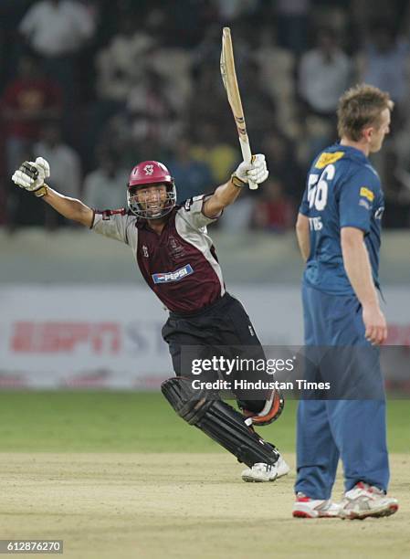 Alfonso Thomas of Somerset hits a wining shot, as he celebrates the victory against Deccan Chargers on the last ball during the Airtel Champions...