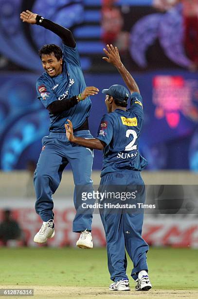 Suman of the Chargers celebrates with Ojha during the Airtel Champions League Twenty20 Group A match between the Deccan Chargers and Somerset CCC at...