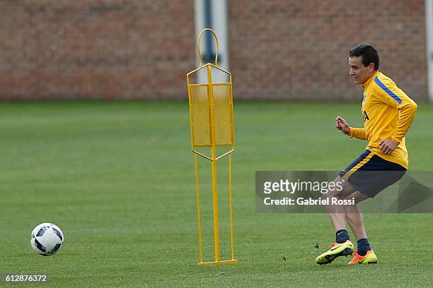 Fernando Zuqui of Boca Juniors kicks the ball during a Boca Juniors training session at Complejo Pedro Pompilio on October 05, 2016 in Buenos Aires,...