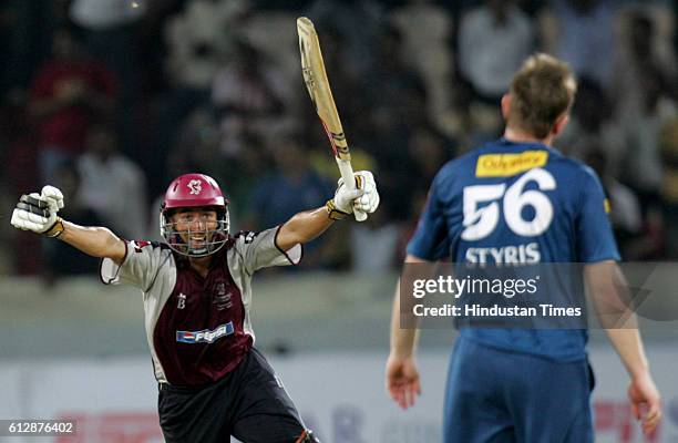 Alfonso Thomas of Somerset celebrates hitting the winning runs during the Airtel Champions League Twenty20 Group A match between the Deccan Chargers...