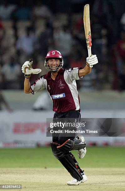Alfonso Thomas of Somerset celebrates hitting the winning runs during the Airtel Champions League Twenty20 Group A match between the Deccan Chargers...