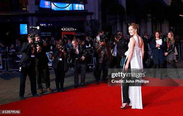 Rosamund Pike attends the 'A United Kingdom' Opening Night Gala screening during the 60th BFI London Film Festival at Odeon Leicester Square on...