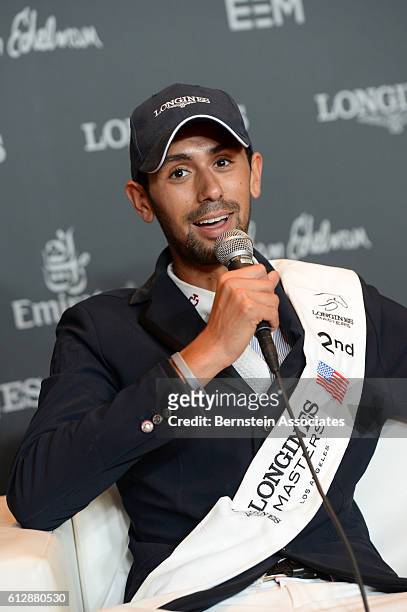 Second place finisher Nayel Nassar takes questions in the press conference following the Longines Grand Prix during the Longines Masters of Los...