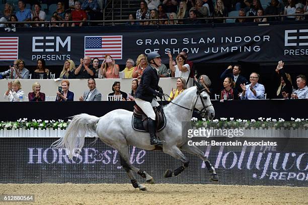 Roger Yves Bost of France competes on Pegase du Murier in the Longines Grand Prix during the Longines Masters of Los Angeles 2016 at Long Beach...