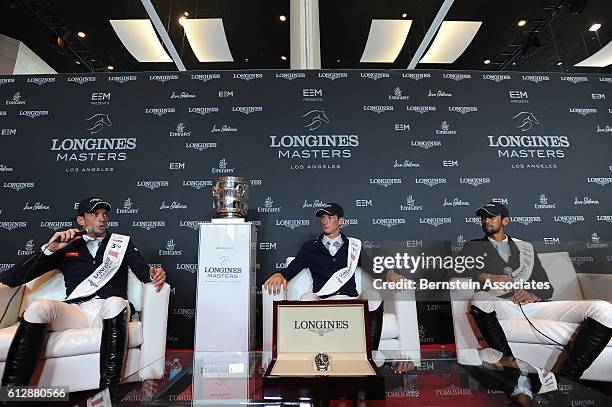 Harrie Smolders, Daniel Deusser, and Nayel Nassar take questions in the press conference following the Longines Grand Prix during the Longines...