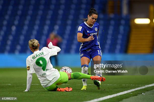 Claire Rafferty of Chelsea Ladies and Anna Blasse of Wolfsburg compete during a UEFA Champions League match between Chelsea Ladies and Wolfsburg at...