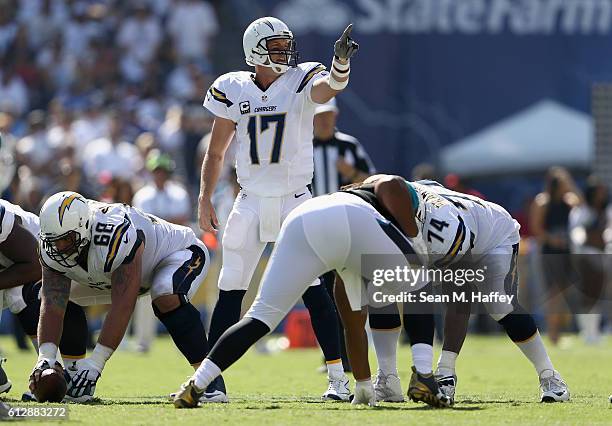 Philip Rivers of the San Diego Chargers calls a play at the line of scrimmage during a game against the Jacksonville Jaguars at Qualcomm Stadium on...