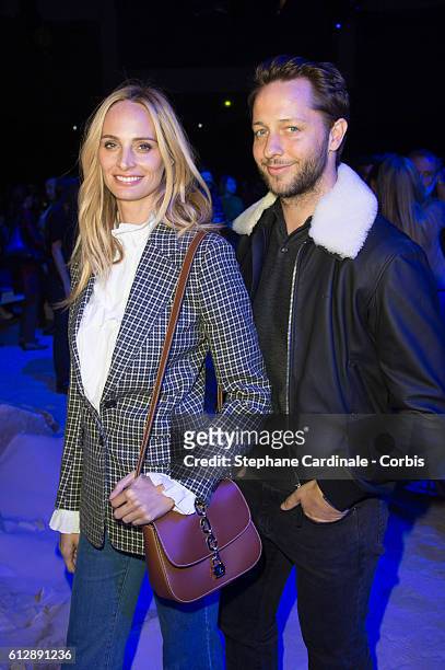 Lauren Santo Domingo and Derek Blasberg attend the Moncler Gamme Rouge show as part of the Paris Fashion Week Womenswear Spring/Summer 2017 on...
