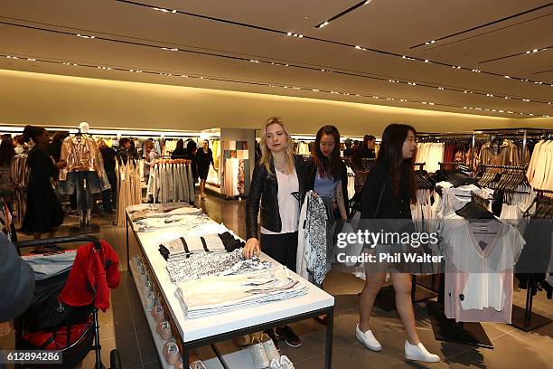 Customers shop for clothing following the opening of New Zealand's first Zara store at Sylvia Park on October 6, 2016 in Auckland, New Zealand.