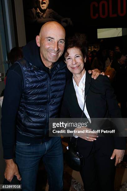 Imitator Nicolas Canteloup and Ex-Wife of Coluche, Veronique Colucci attend the Coluche Exhibition Opening. This exhibition is organized for the 30...