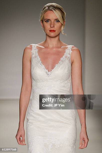 Model walks the runway at the Alfred Angelo Spring 2017 Bridal Show with Disney Weddings at EZ Studios on October 5, 2016 in New York City.