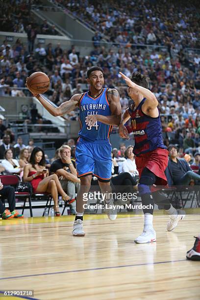 Josh Huestis of the Oklahoma City Thunder passes against FC Barcelona Lassa as part of the 2016 Global Games on October 5, 2016 at the Palau Sant...