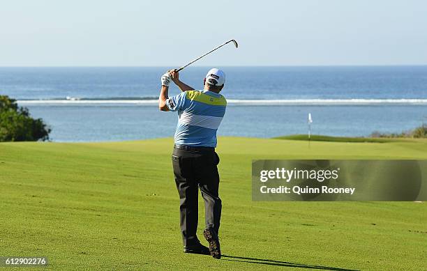 Peter O'Malley of Australia plays an approach shot during day one of the Fiji International at Natadola Bay Golf Course on October 6, 2016 in...