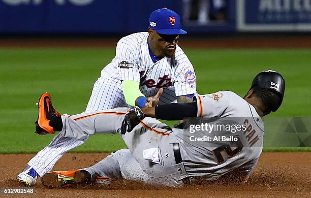 Denard Span of the San Francisco Giants is caught stealing at second by Jose Reyes of the New York Mets in the fourth inning during their National...