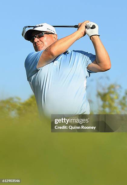 Peter O'Malley of Australia plays an approach shot during day one of the Fiji International at Natadola Bay Golf Course on October 6, 2016 in...