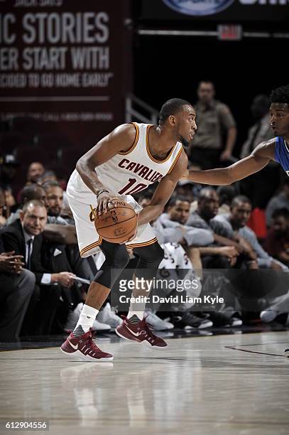 Markel Brown of the Cleveland Cavaliers handles the ball against the Orlando Magic on October 5, 2016 at Quicken Loans Arena in Cleveland, Ohio. NOTE...
