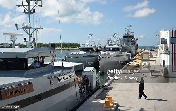 Nine ships from the Royal Bahamas Defence Force, research vessel Walton Smith and a contract vessel take shelter at Naval Air Station Mole Pier as...