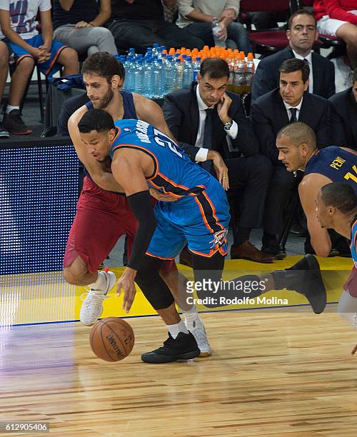 Andre Roberson, #21 of Oklahoma City Thunder competes with Stratos Perperoglou, #33 of FC Barcelona Lassa during the NBA Global Games Spain 2016 FC...