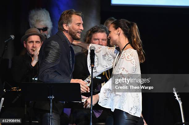 Honoree Kenny Loggins and Event Committee Chair & National Board Member Nadine Levitt speak onstage during Little Kids Rock Benefit 2016 at Capitale...