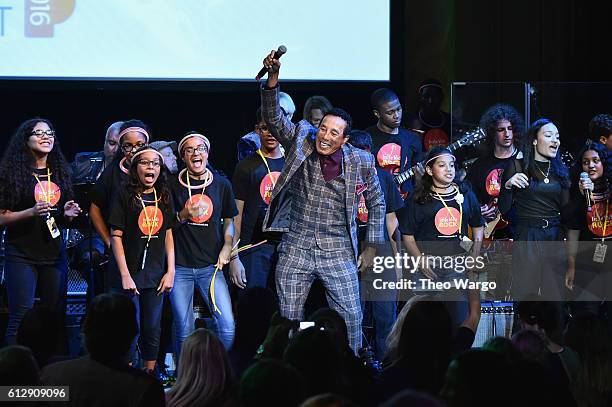 Singer-songwriter Smokey Robinson performs onstage with School of Rock students during Little Kids Rock Benefit 2016 at Capitale on October 5, 2016...