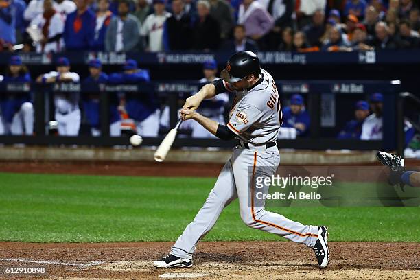 Conor Gillaspie of the San Francisco Giants hits a three-run homerun in the ninth inning against the New York Mets during their National League Wild...