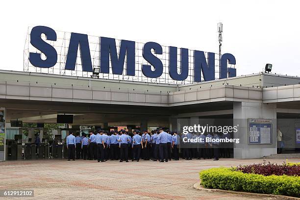 Security workers gather at the Samsung Electronics Vietnam Co. Plant at Yen Phong Industrial Park in Bac Ninh Province, Vietnam, on Thursday, Sept....