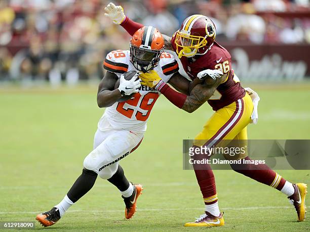 Running back Duke Johnson of the Cleveland Browns is tackled by safety Su'a Cravens of the Washington Redskins during a game on October 2, 2016 at...