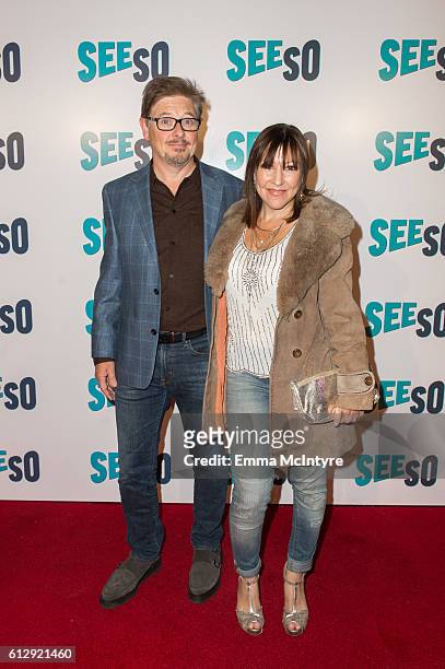 Actor/comedian Dave Foley and Crissy Guerrero arrive at the Seeso original screening of 'Bajillion Dollar Properties' season 2 at Ace Hotel on...