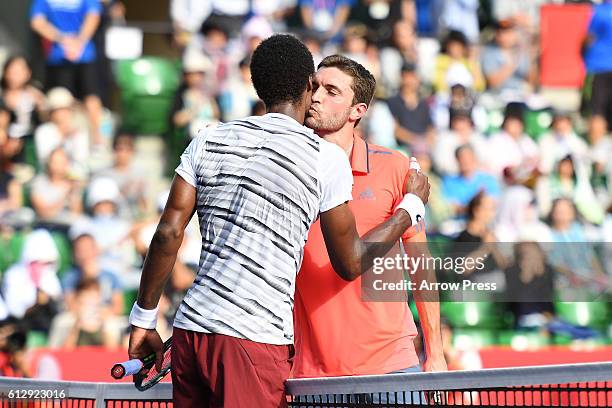 Gael Monfils of France greets Gilles Simon of France after winning the men's singles second round match on day four of Rakuten Open 2016 at Ariake...