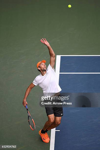 Ivo Karlovic of Croatia makes a serve during the men's singles second round match against Janko Tipsarevic of Serbia on day four of Rakuten Open 2016...