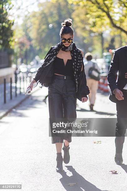 Model Taylor Hill outside Miu Miu on October 5, 2016 in Paris, France.