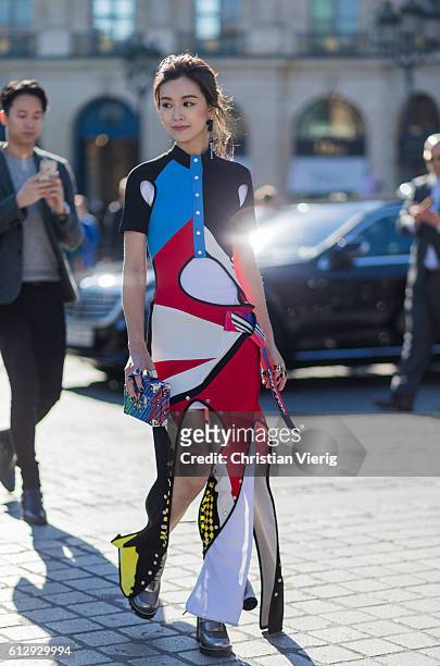 Actress Janice Man wearing a Louis Vuitton dress outside Louis Vuitton on October 5, 2016 in Paris, France.