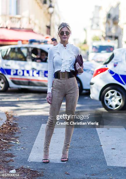 Lala Rudge outside Moncler Gamme Rouge on October 5, 2016 in Paris, France.