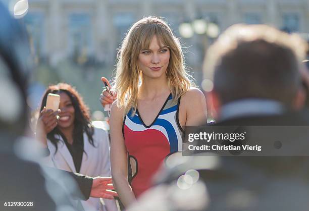 Model Karlie Kloss outside Louis Vuitton on October 5, 2016 in Paris, France.