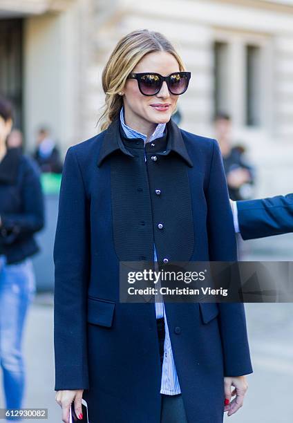 Olivia Palermo outside Moncler Gamme Rouge on October 5, 2016 in Paris, France.