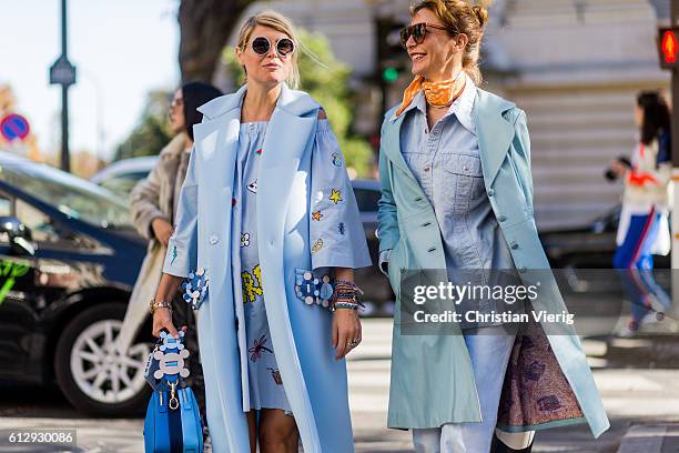 Elisa Nalin and Ece Sukan outside Moncler Gamme Rouge on October 5, 2016 in Paris, France.