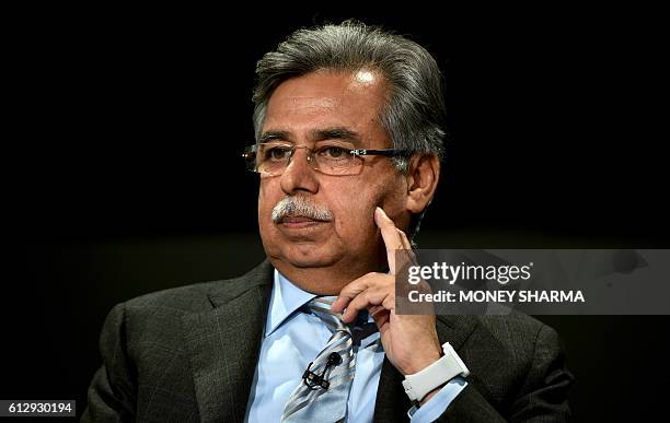 Chairman, Managing Director and Chief Executive officer of Hero MotoCorp, India, Pawan Munjal looks on at the session 'India Economic Update' during...