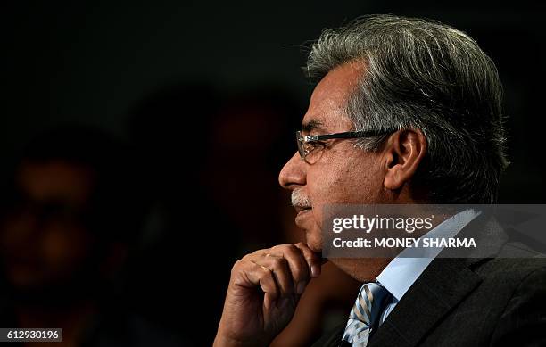 Chairman, Managing Director and Chief Executive officer of Hero MotoCorp, India, Pawan Munjal looks on at the session 'India Economic Update' during...