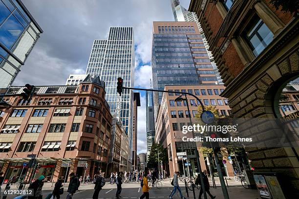 People walk at the finance district of Frankfurt on October 5, 2016 in Frankfurt, Germany. Banks across Europe are struggling as their profits have...