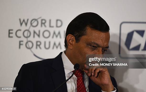 Mahindra & Mahindra executive director Pawan Goenka, president of the automotive and farm equipment sectors, looks on at a session named 'Shaping the...