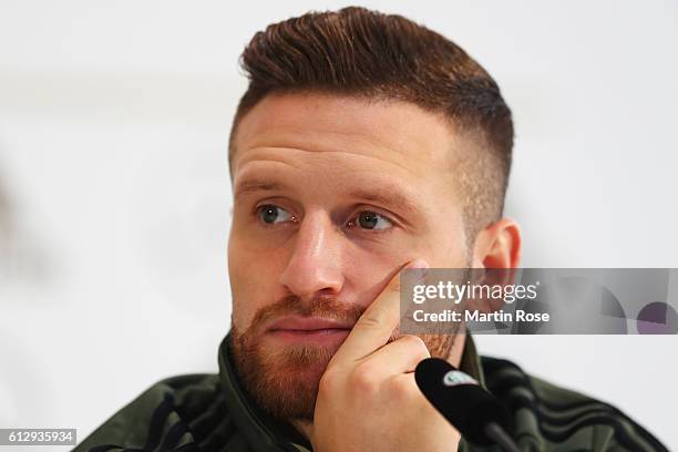 Shkodran Mustafi of Germany talks during a press conference at Mercedes Autohaus on October 6, 2016 in Hamburg, Germany.