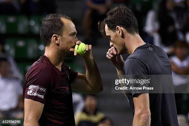 Jamie Murray of Great Britain and Bruno Soares of Brazil talk during the men's doubles quarterfinals match against Juan Sebastian Cabal of Colombia...